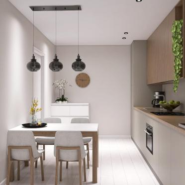 Интерьер кухни cветильниками над столом  смотреть на Basicdecor