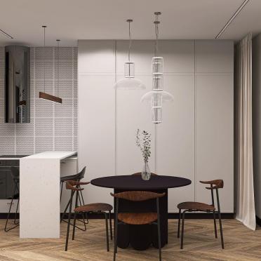 Интерьер кухни cветильниками над столом  смотреть на Basicdecor