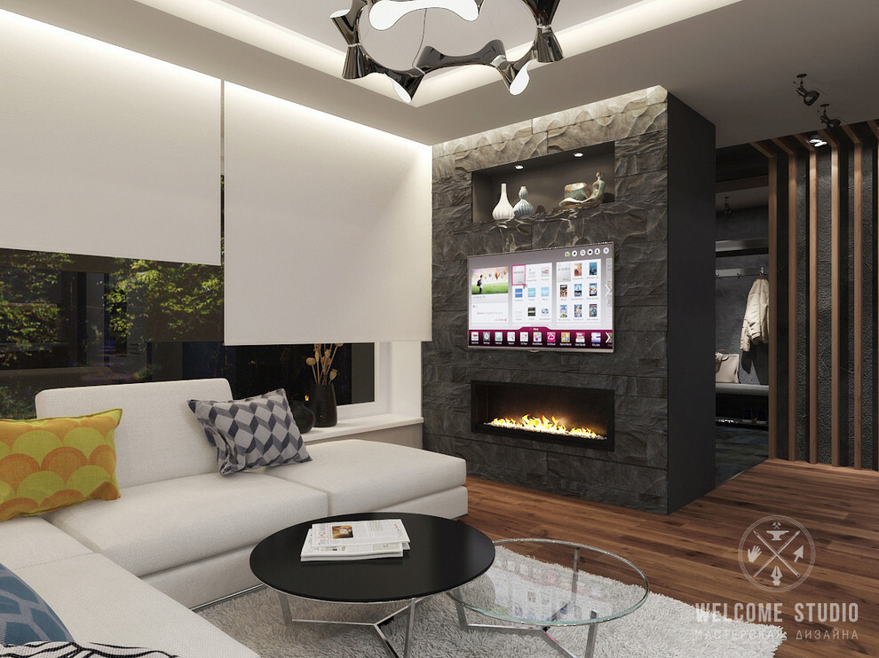 Интерьер гостиной с керамогранитом на стену с телевизором, рейками с подсветкой, подсветкой настенной, подсветкой светодиодной и с подсветкой в современном стиле
