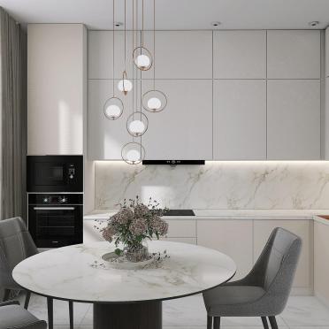 Интерьер кухни cветильниками над столом  смотреть на Basicdecor