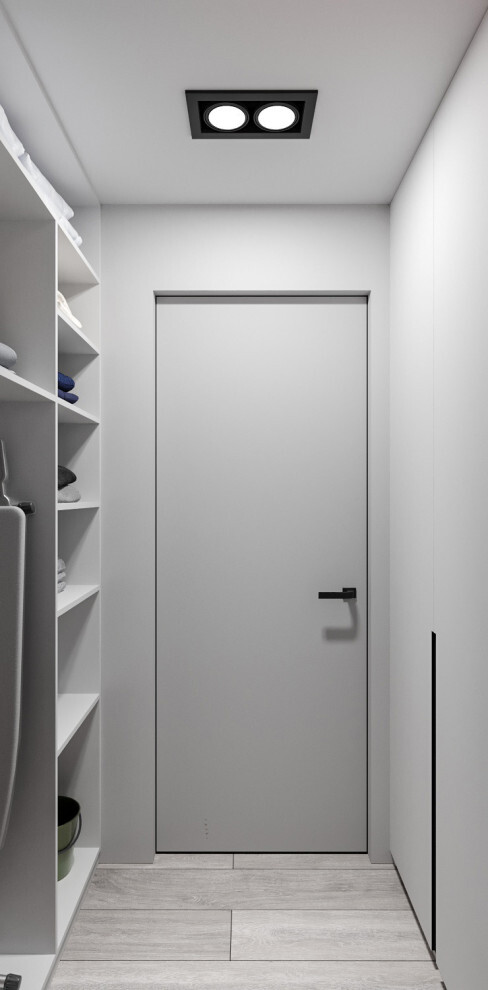 Интерьер гардеробной с без дверей, проходной, шкафами вокруг двери и дверными жалюзи