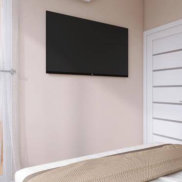 Интерьер спальни с телевизором на стене  смотреть на Basicdecor
