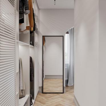 Интерьер гардеробной с проходной и зеркалом на двери  смотреть на Basicdecor