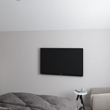 Интерьер спальни с телевизором на стене  смотреть на Basicdecor
