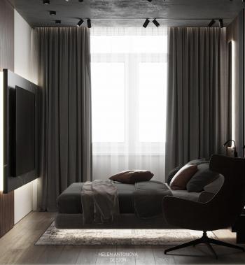 Интерьер гостиной с зонированием шторами и светильниками над кроватью в стиле лофт