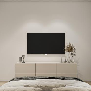 Интерьер спальни с телевизором на стене  смотреть на Basicdecor