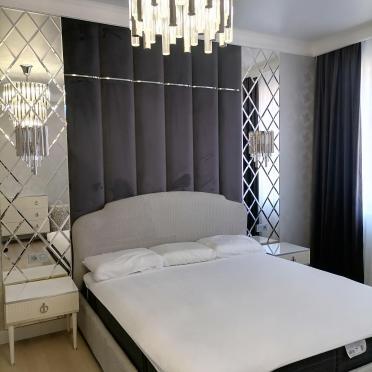 Интерьер спальни cветильниками над кроватью  смотреть на Basicdecor