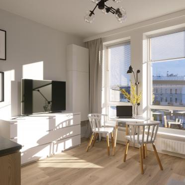 Интерьер кухни cветильниками над столом  смотреть на Basicdecor
