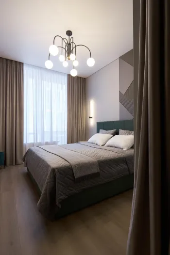 Интерьер спальни cветильниками над кроватью  смотреть на Basicdecor