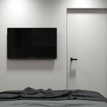 Интерьер спальни с телевизором на стене  смотреть на Basicdecor