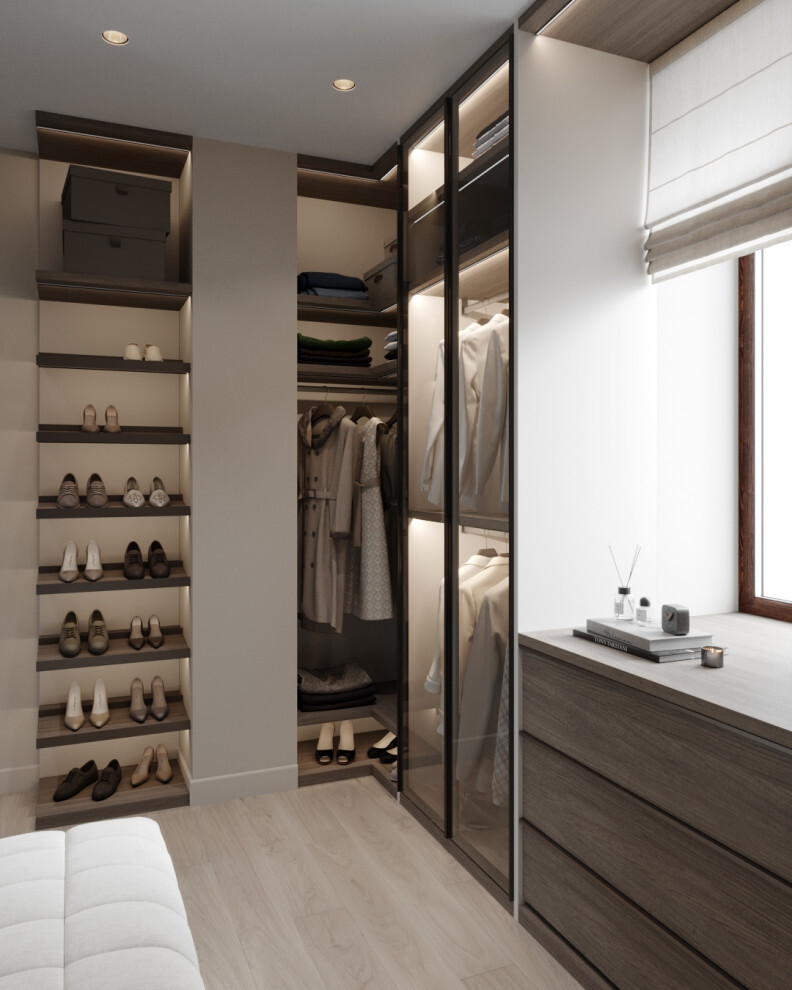 Интерьер гардеробной с гардеробной и шкафом у кровати в современном стиле