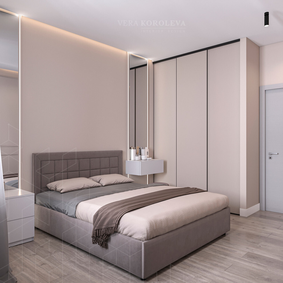 Интерьер спальни с шкафом над кроватью и шкафом напротив кровати в современном стиле