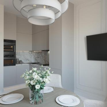 Интерьер кухни cветильниками над столом  смотреть на Basicdecor