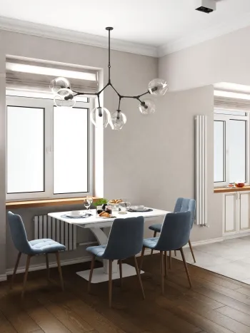 Интерьер кухни cветильниками над столом  смотреть на Basicdecor