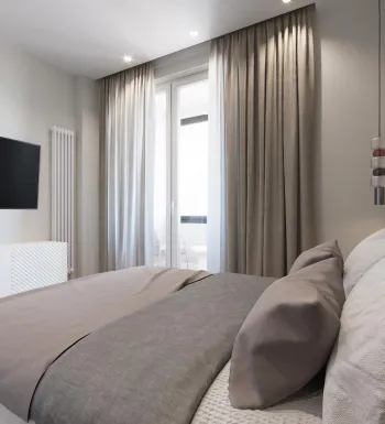 Интерьер спальни cветильниками над кроватью  смотреть на Basicdecor