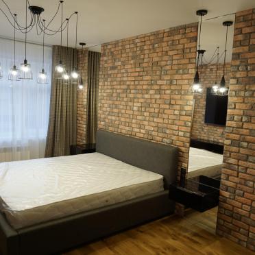 Интерьер спальни cветильниками над кроватью  смотреть на Basicdecor