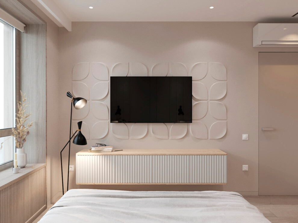 Интерьер спальни cтеной с телевизором, телевизором на стене, керамогранитом на стену с телевизором, бра над кроватью и подсветкой настенной в современном стиле
