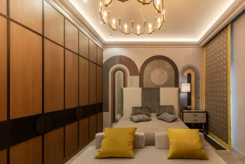 Интерьер спальни с нишей с подсветкой, светильниками над кроватью и с подсветкой  смотреть на Basicdecor