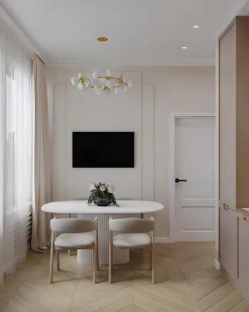 Интерьер кухни cветильниками над столом  смотреть на Basicdecor